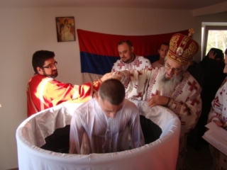Крштење у заједници Земља живих