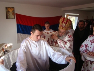 Крштење у заједници Земља живих